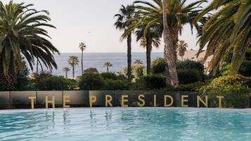 Outdoor pool, pool umbrellas, sun loungers