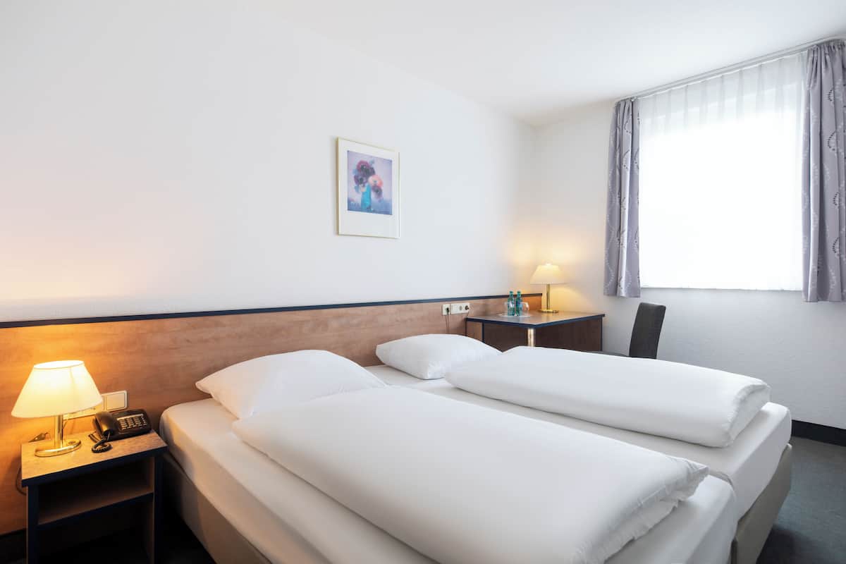 Economy-Doppelzimmer | Schreibtisch, schallisolierte Zimmer, Babybetten, kostenloses WLAN