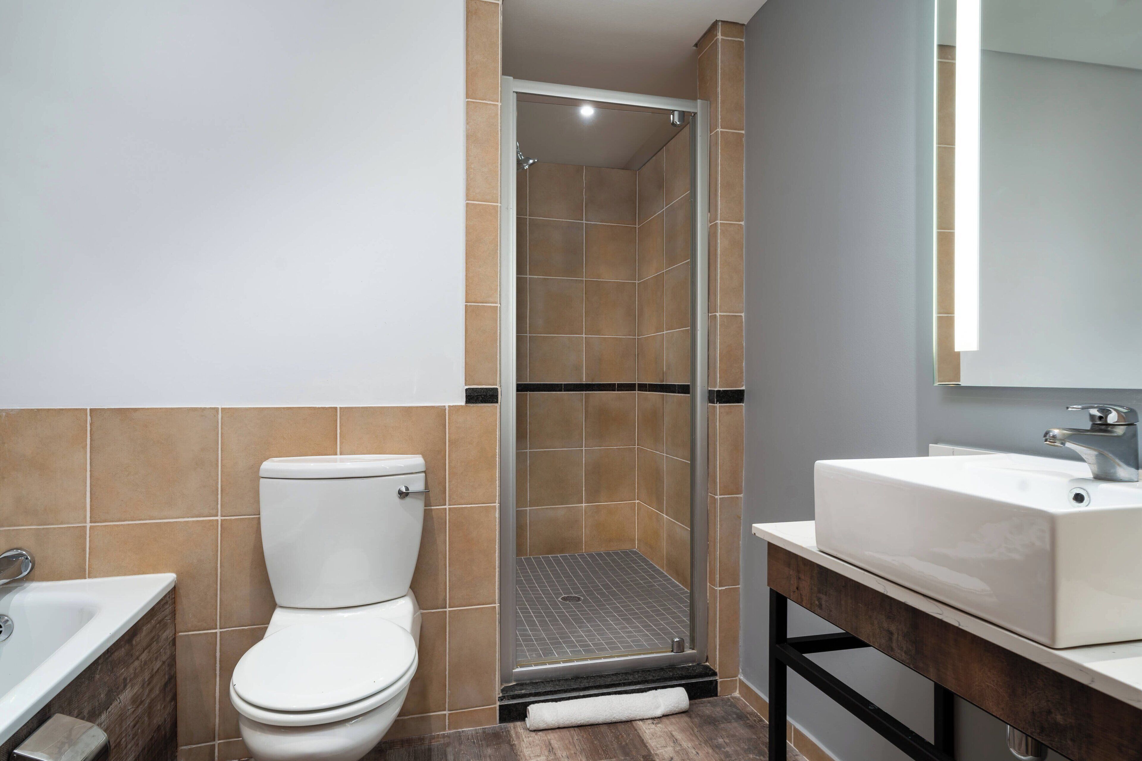 separate bathtub and shower, deep-soaking bathtub, free toiletries