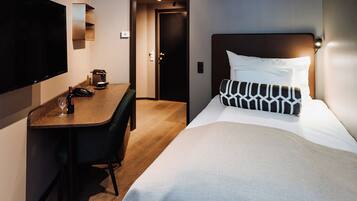 Roupas de cama premium, frigobar, cortinas blackout