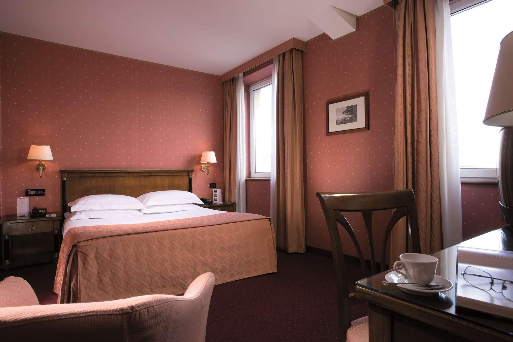 Luxe beddengoed, donsdekens, een minibar, een kluis op de kamer