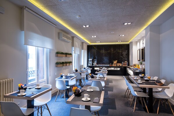 Daily buffet breakfast (EUR 15 per person)
