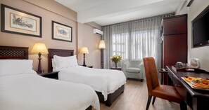 Premium bedding, in-room safe, individually decorated