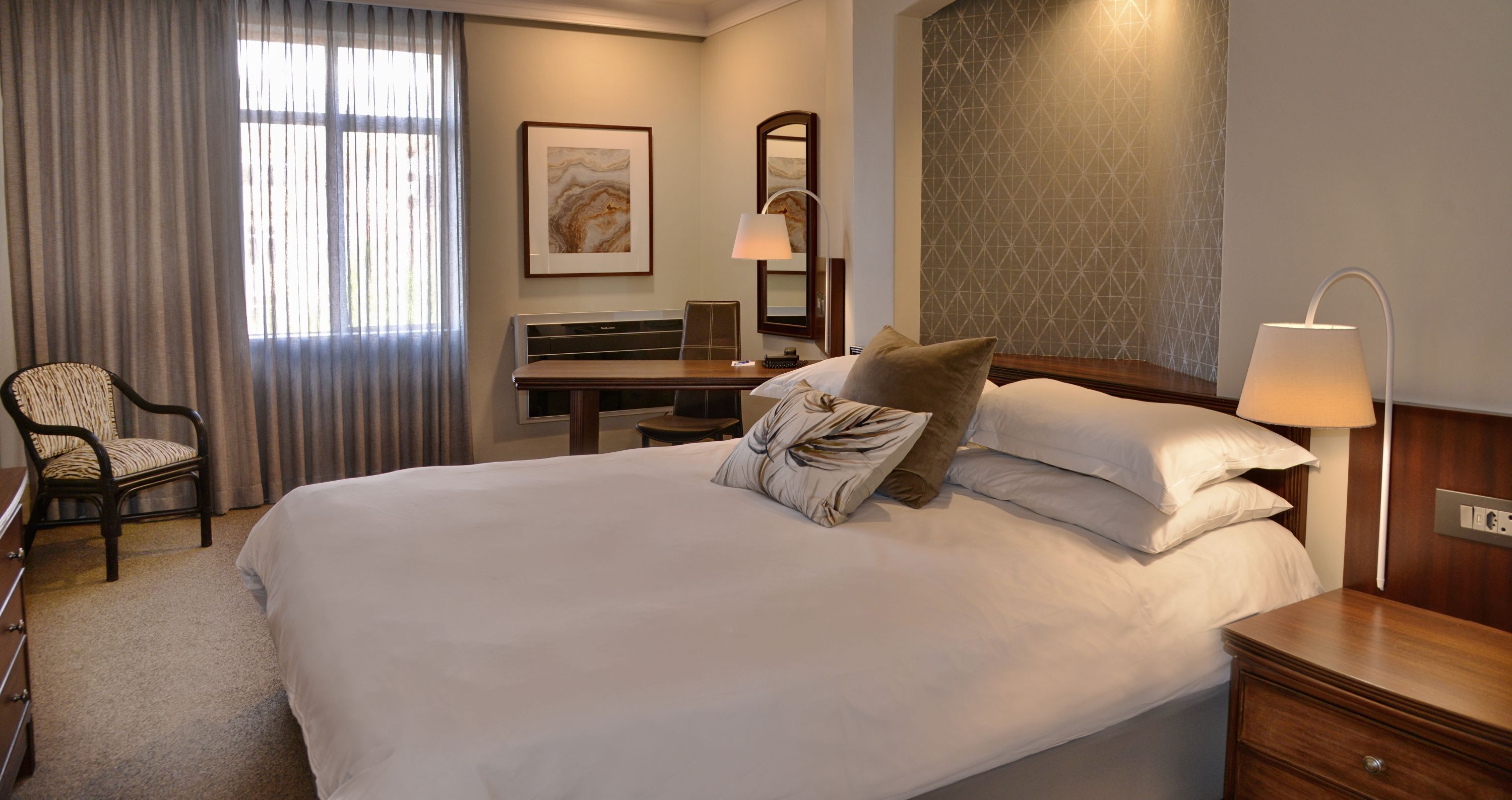Premium bedding, down duvets, in-room safe, individually furnished