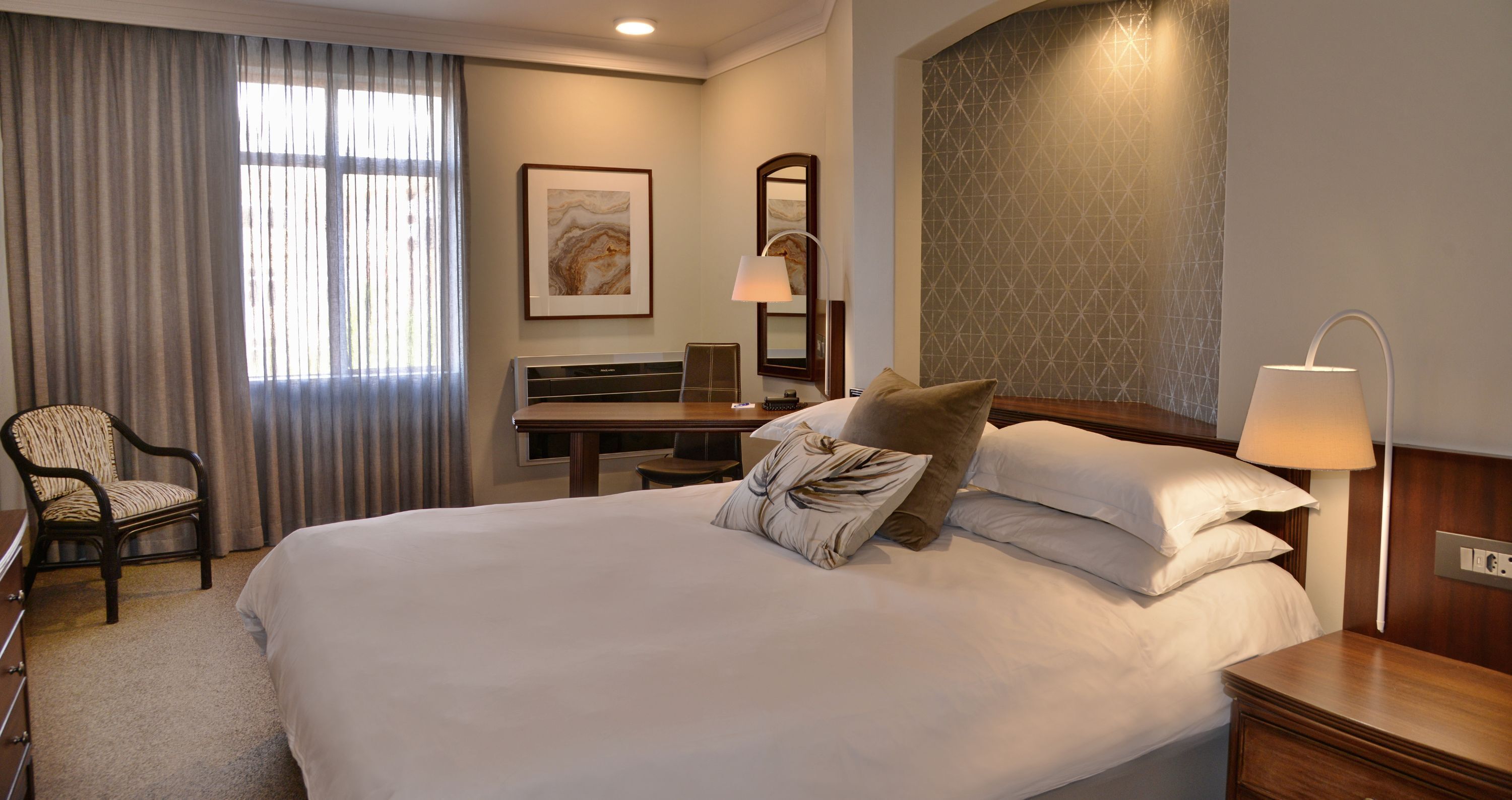 Premium bedding, down duvets, in-room safe, individually furnished