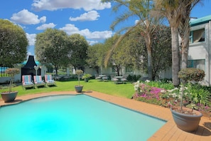 Outdoor pool, pool umbrellas, pool loungers
