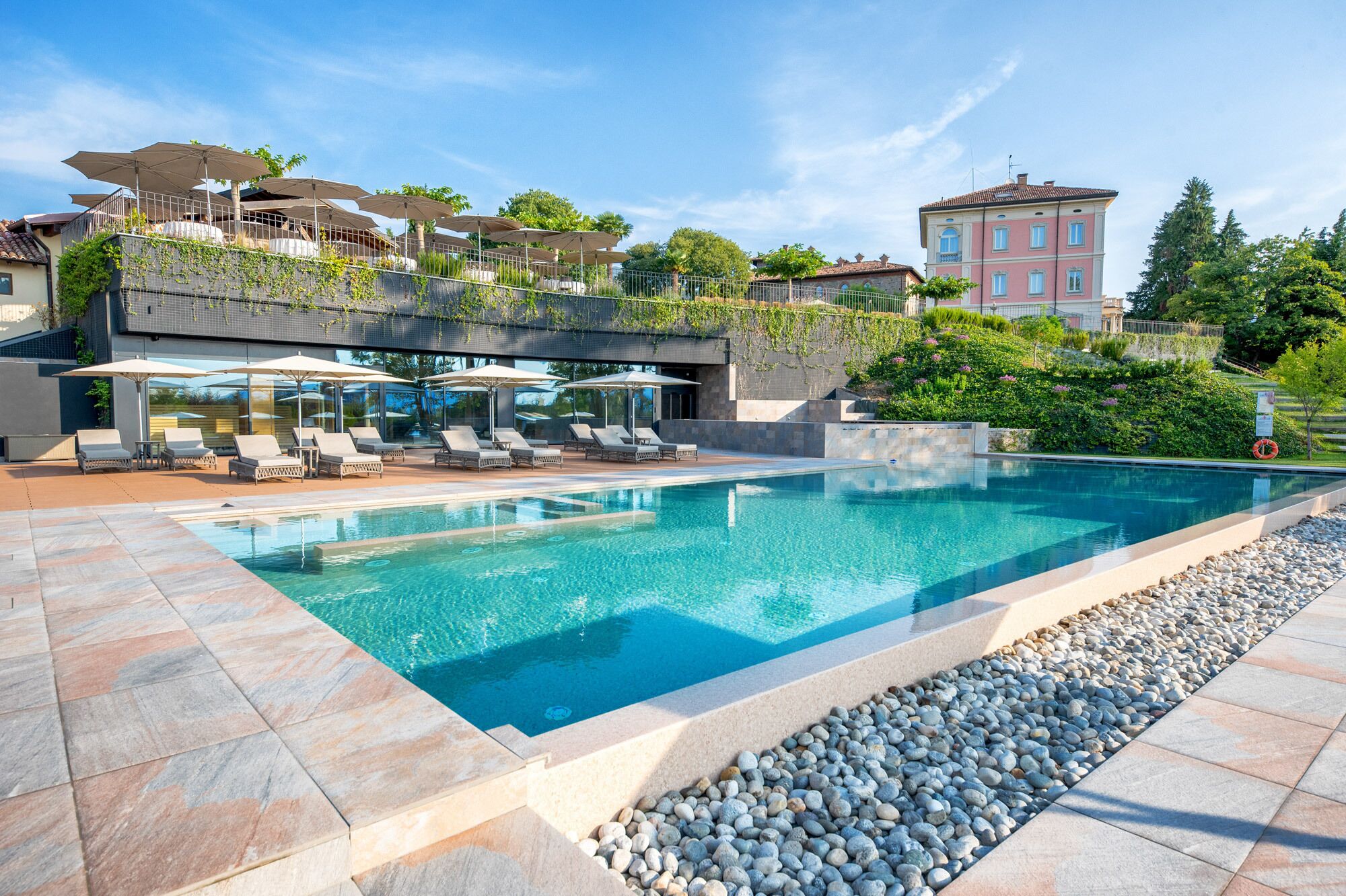 seasonal outdoor pool, pool umbrellas, pool loungers