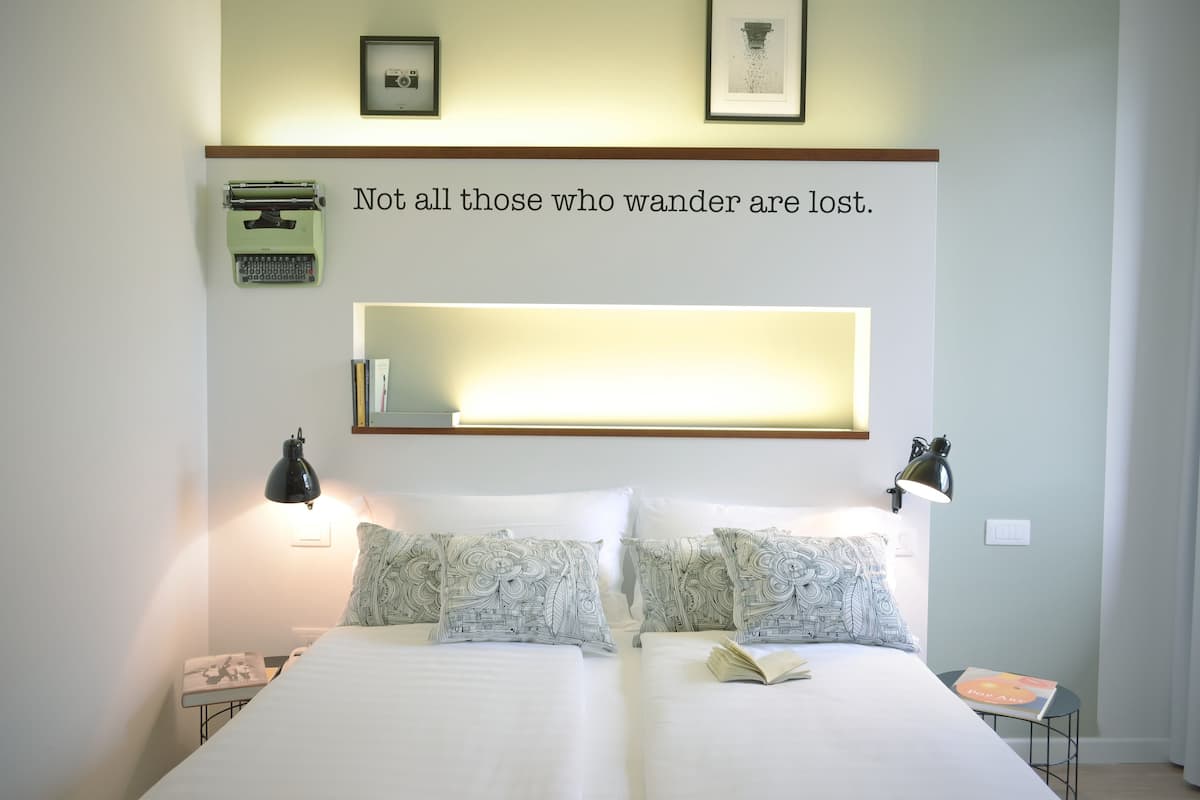 Quadruple Room | Hypo-allergenic bedding, minibar, in-room safe, desk
