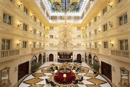 Triple Room | Minibar, in-room safe, desk, blackout drapes