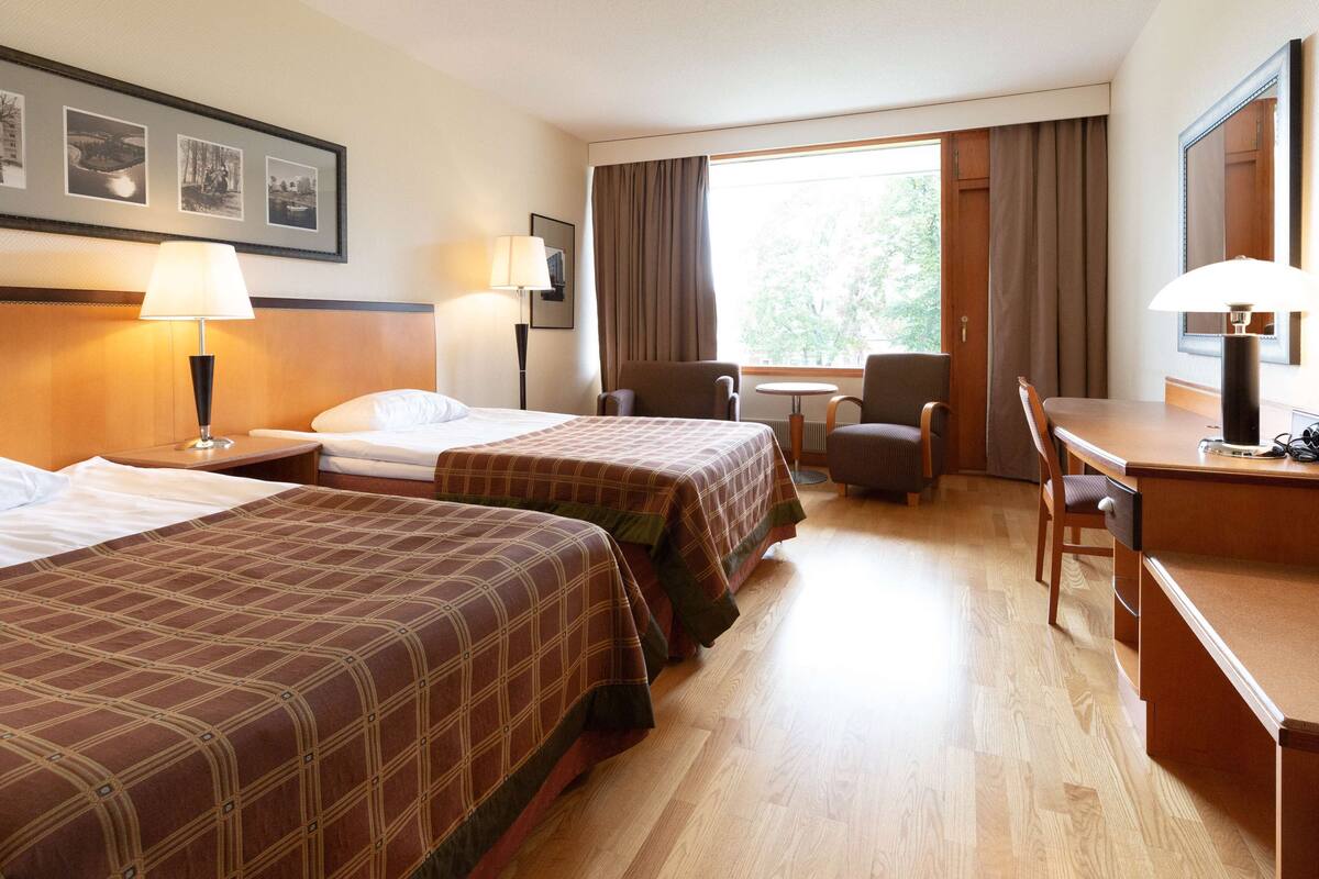 Desk, blackout curtains, free WiFi, bed sheets