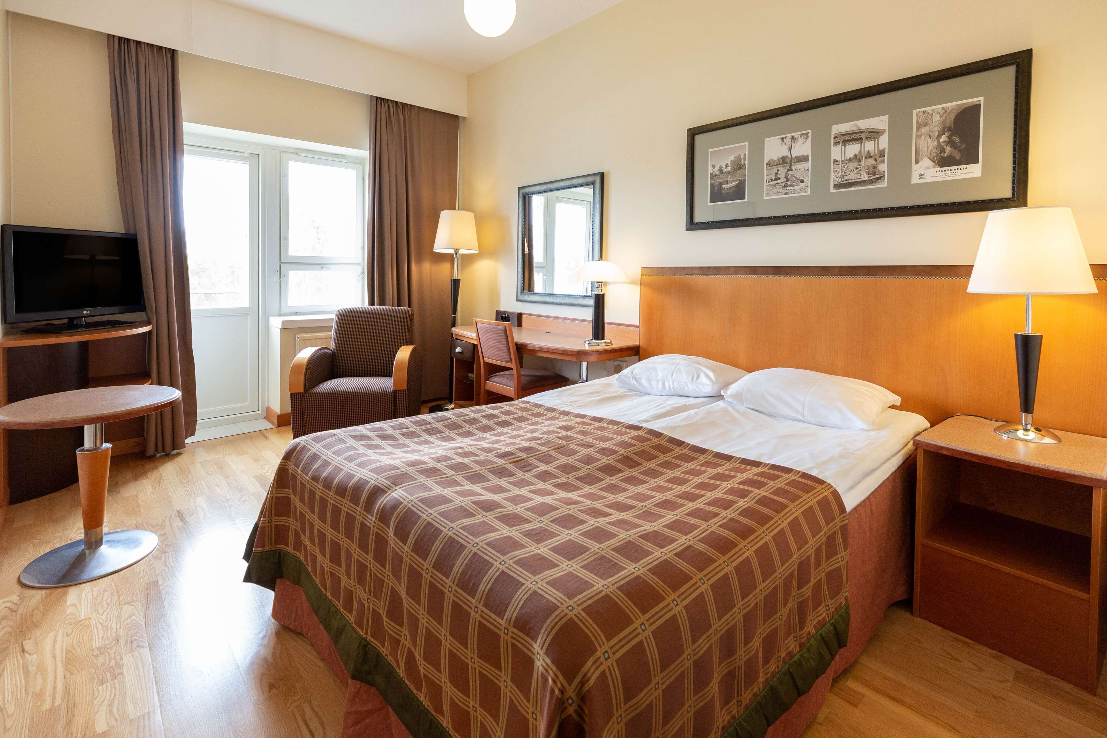 Desk, blackout curtains, free WiFi, bed sheets