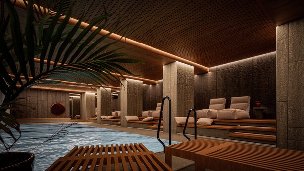 A spa area with wooden benches, a massage table, and a large plant. - Bergstadens Hotel & SPA (Roros)