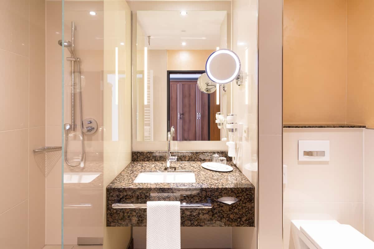 superior double room | bathroom | free toiletries, hair dryer, towels