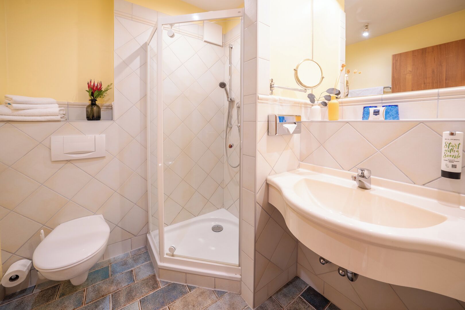 hair dryer, bathrobes, towels