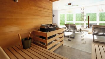 A sauna room with wooden benches, a wooden table, and a sauna table with towels.