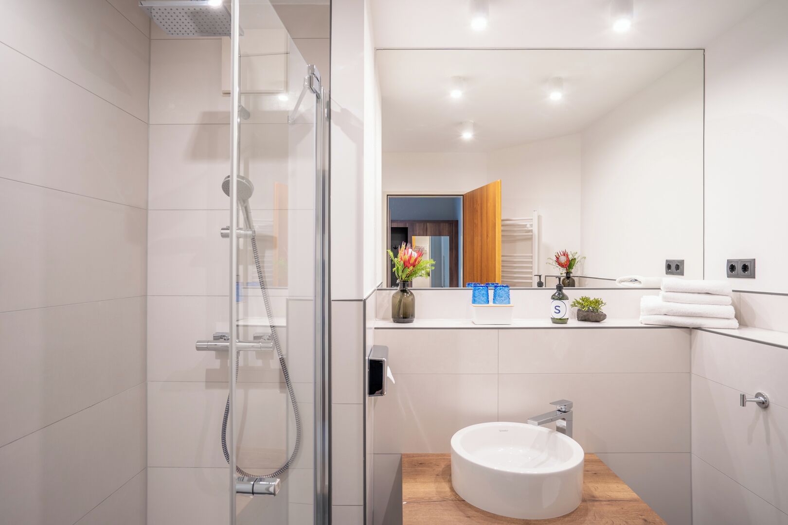 hair dryer, bathrobes, towels