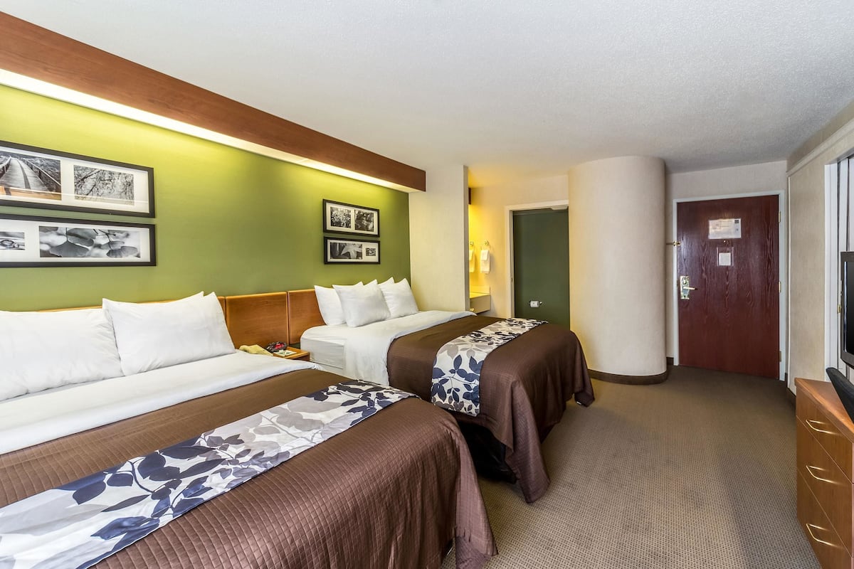 Down comforters, pillowtop beds, desk, laptop workspace
