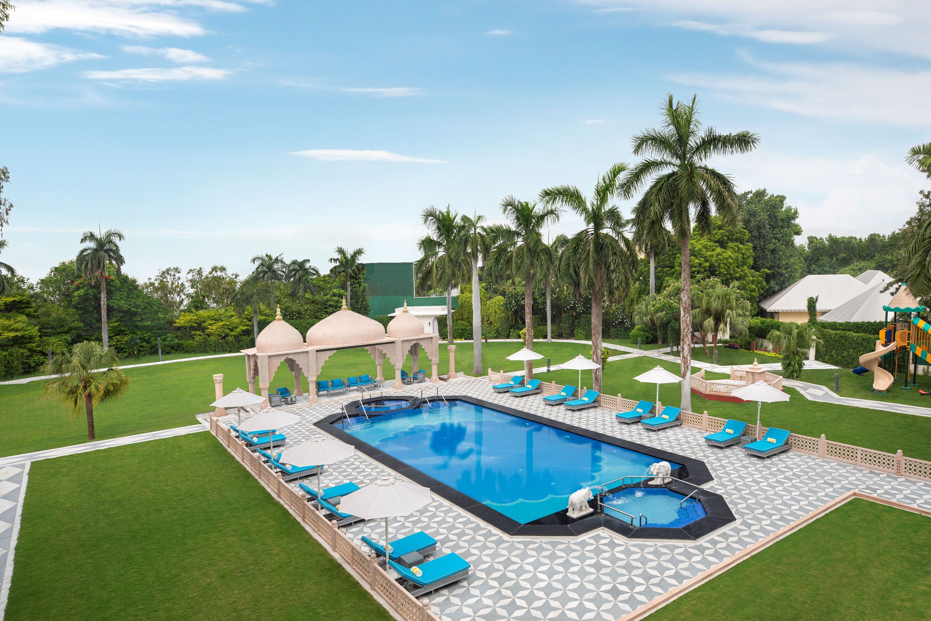 outdoor pool, open 8:00 am to 8:00 pm, pool umbrellas, pool loungers