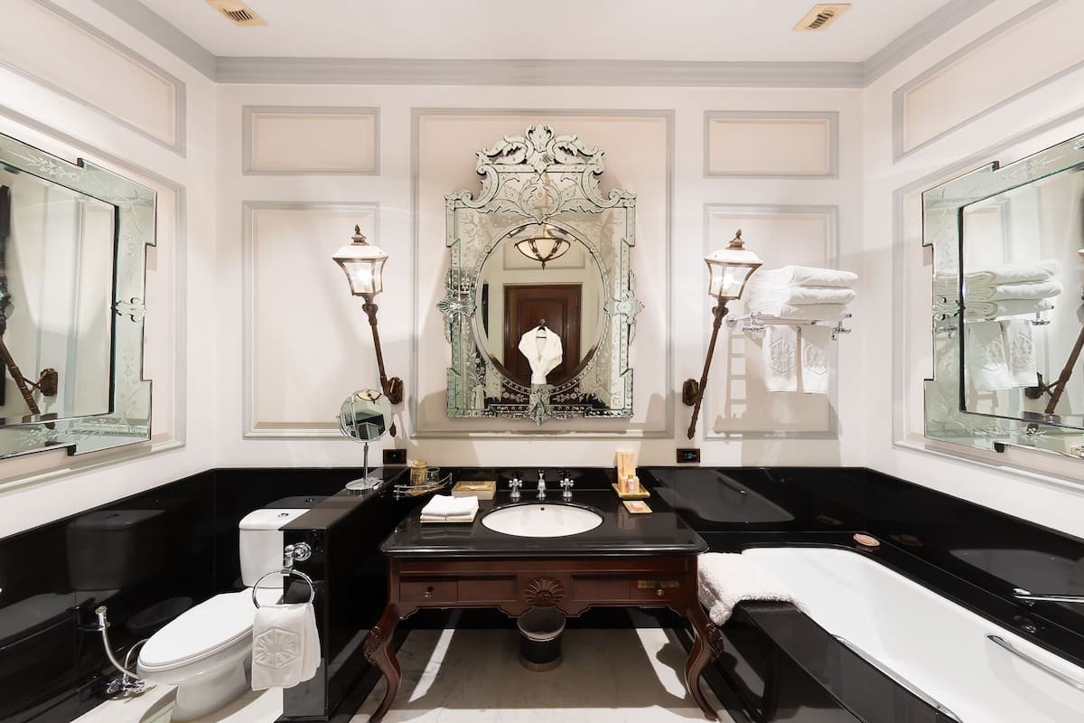 suite, 1 bedroom, garden view (historical) | bathroom | separate bathtub and shower, deep-soaking bathtub, designer toiletries