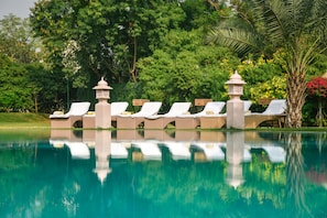 Outdoor pool, pool umbrellas, sun loungers