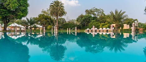 Outdoor pool, pool umbrellas, pool loungers