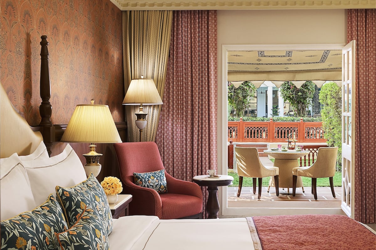 luxury room, 1 king bed, garden view (with sitout) | premium bedding, minibar, in-room safe, desk