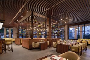 3 restaurants, breakfast, lunch, dinner served; Indian cuisine