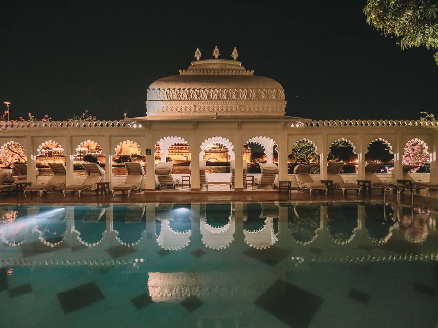 Outdoor pool, open 7:00 AM to 9:00 PM, pool umbrellas, pool loungers