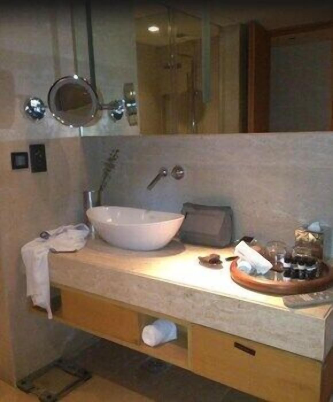 Bathroom | Shower, designer toiletries, hair dryer, slippers