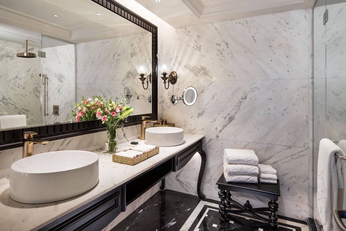 presidential suite | bathroom | designer toiletries, hair dryer, bathrobes, slippers