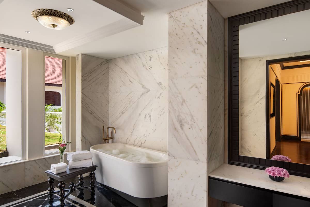 presidential suite | bathroom | designer toiletries, hair dryer, bathrobes, slippers