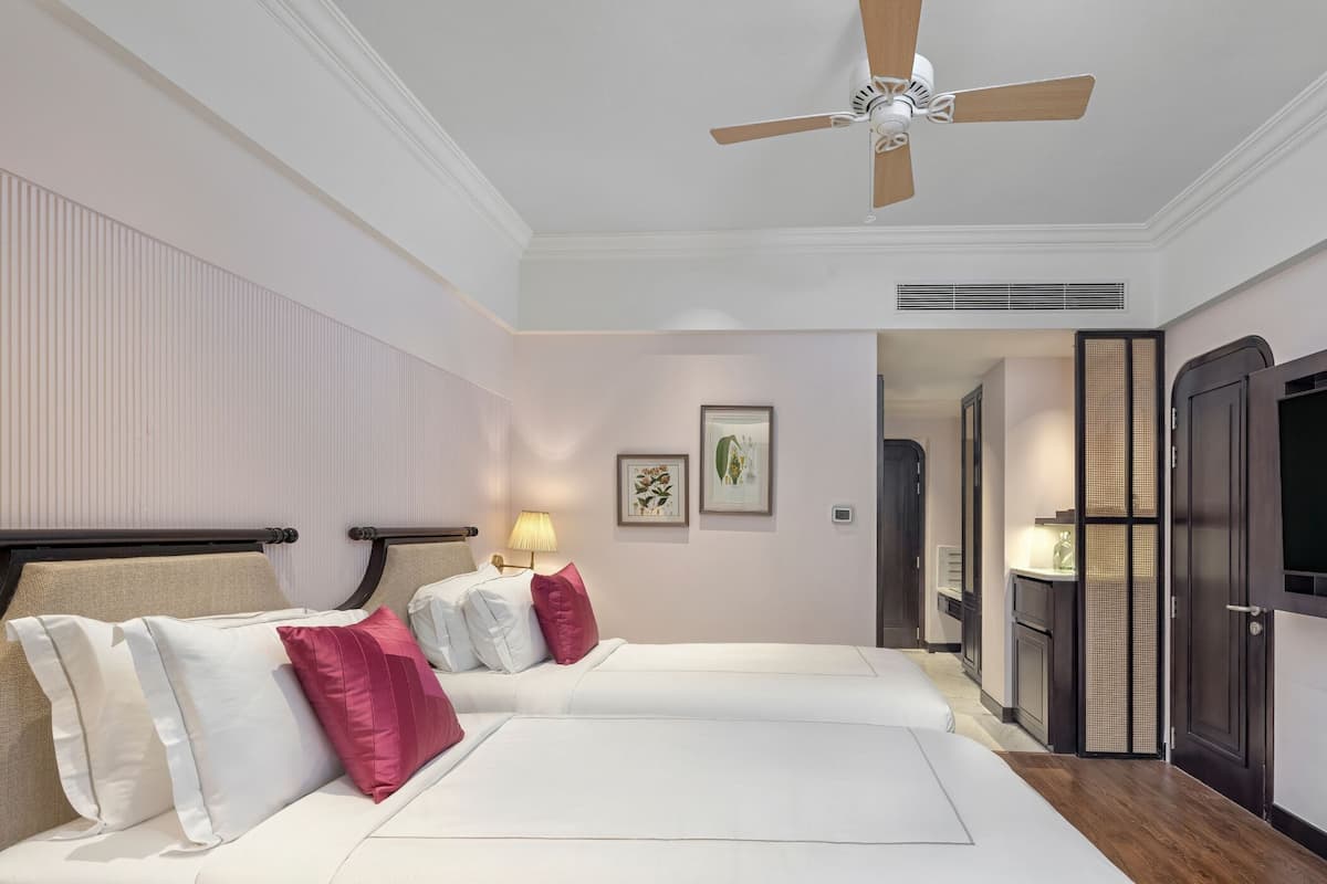 Premium bedding, down duvets, minibar, in-room safe