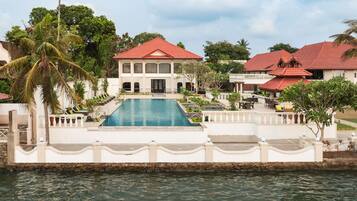 Outdoor pool, pool umbrellas, pool loungers