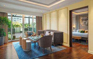 Deluxe Suite, 1 King Bed (Garden) | Living area | 49-inch LCD TV with cable channels, TV, pay movies