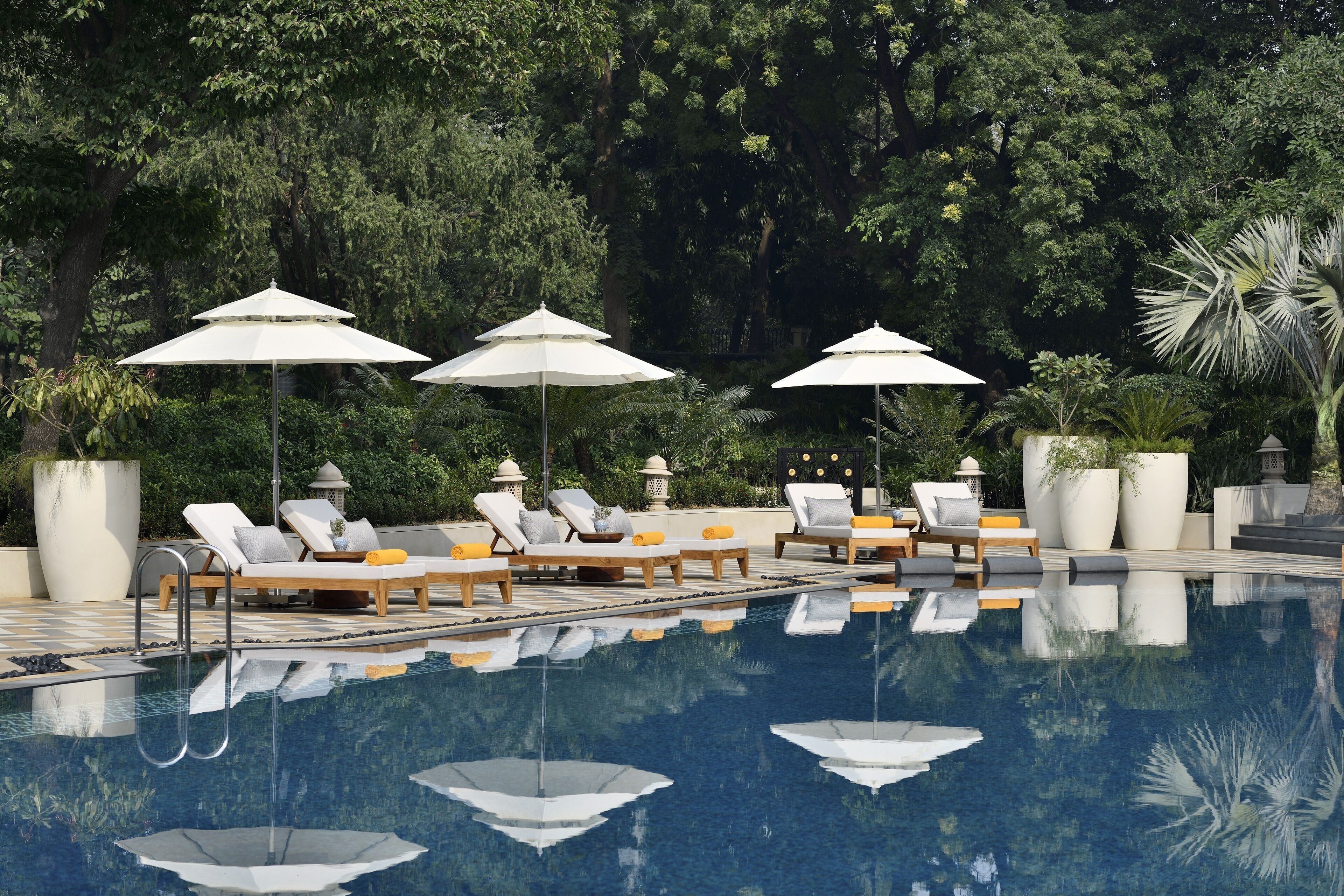 outdoor pool, pool umbrellas, pool loungers
