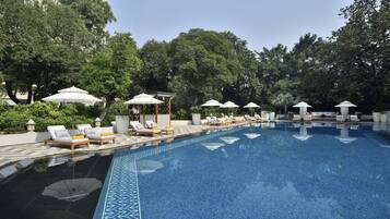 Outdoor pool, pool umbrellas, sun loungers