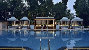 Outdoor pool, pool umbrellas, sun loungers