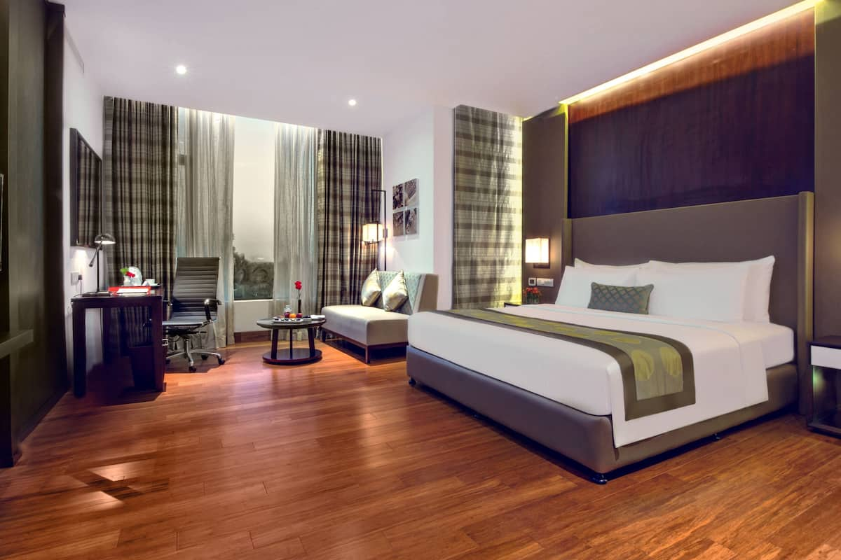 Premium King Room with Airport Pick up and Drop off including 15% off on Food and Soft Beverages+Spa