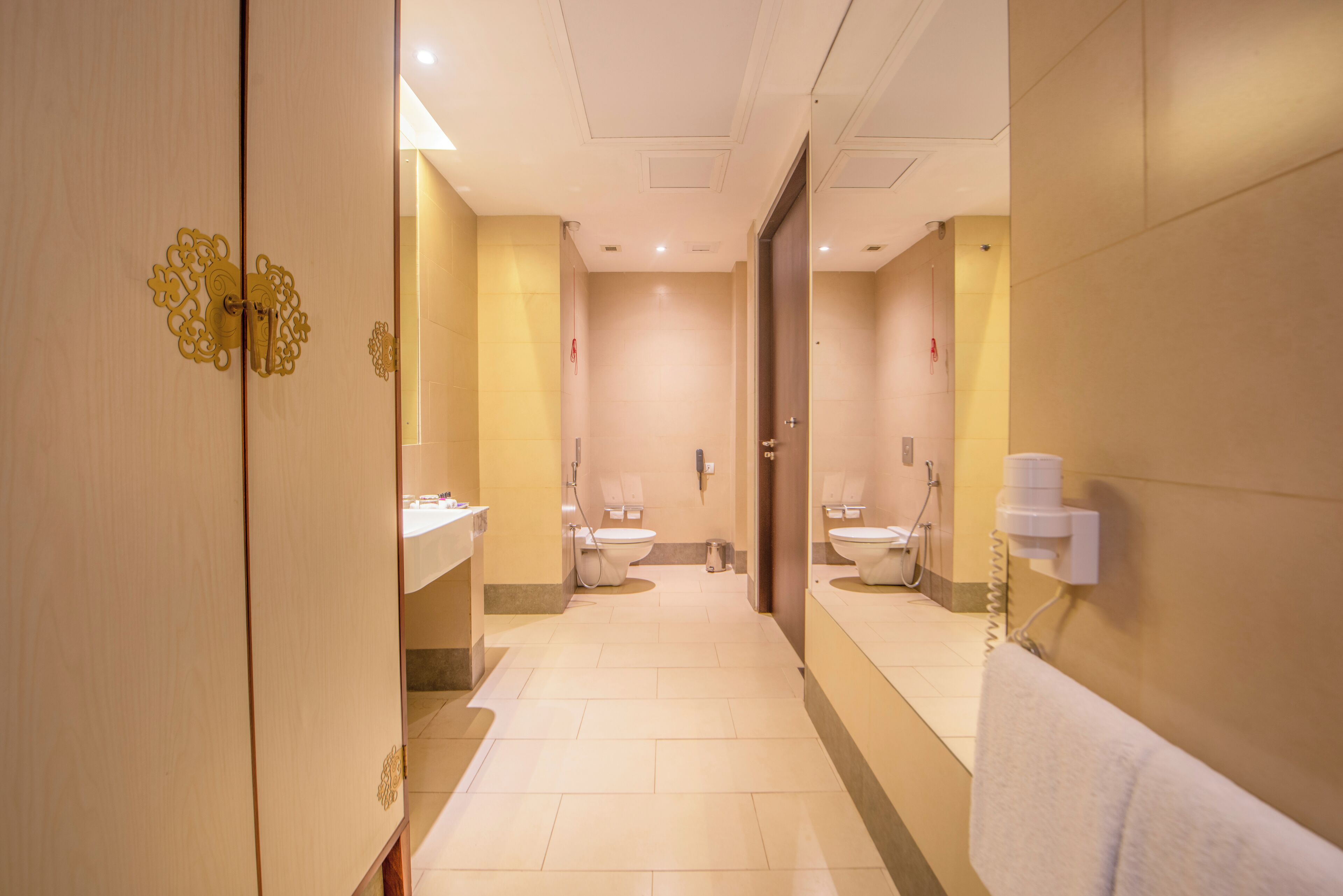 executive suite room with return airport transfer with 15% off on food and soft beverages + spa | bathroom | combined shower/bathtub, free toiletries, hair dryer, bathrobes