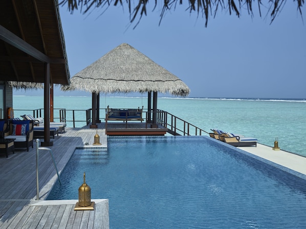 Outdoor pool, pool umbrellas, pool loungers