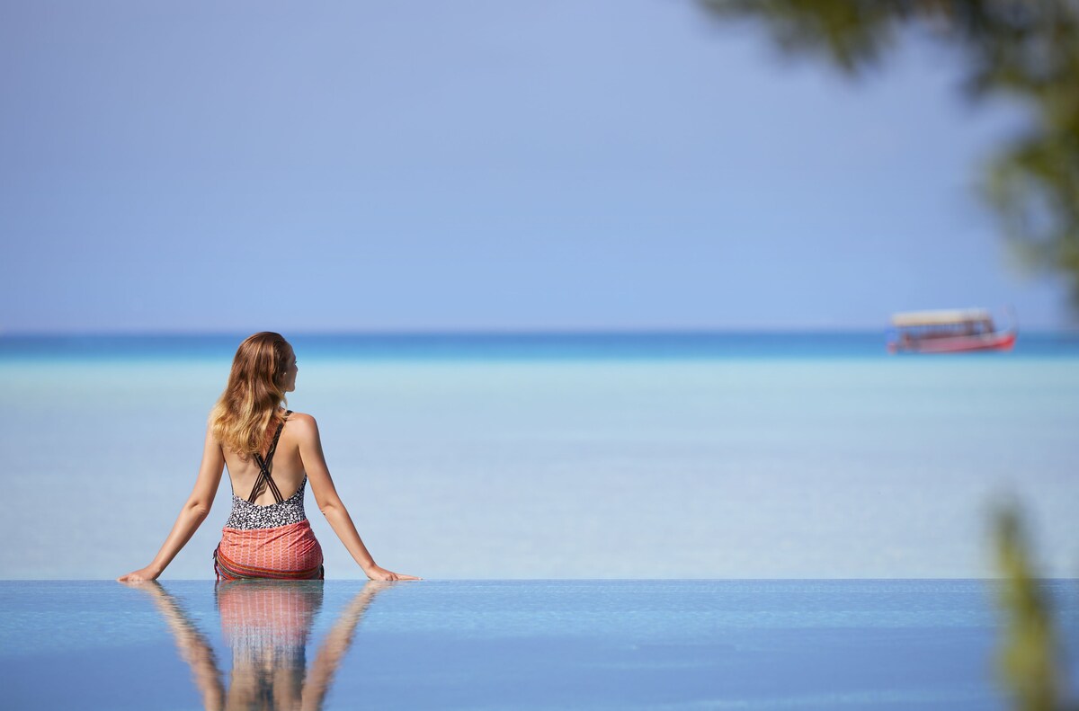 Outdoor pool, pool umbrellas, pool loungers