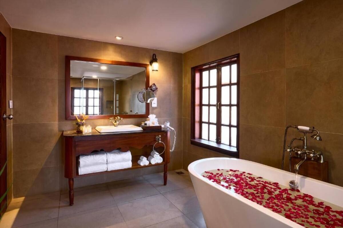 Bathroom | Shower, rainfall showerhead, designer toiletries, hair dryer