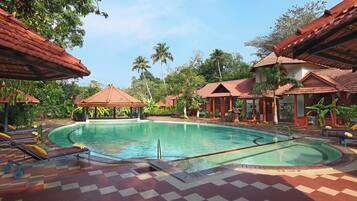 Outdoor pool, open 6:00 AM to 8:00 PM, pool umbrellas, pool loungers