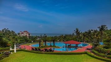 Outdoor pool, open 6:00 AM to 8:00 PM, pool umbrellas, sun loungers