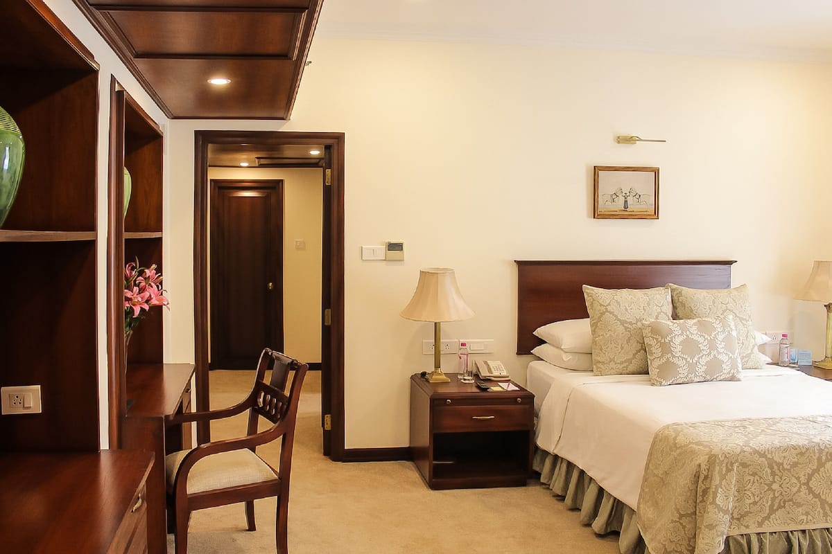 SeleQtions Suite | Ropa de cama de alta calidad y minibar