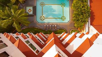 Executive Suite, 1 Bedroom | Outdoor pool | Outdoor pool, open 6:00 AM to 8:00 PM, pool umbrellas, sun loungers