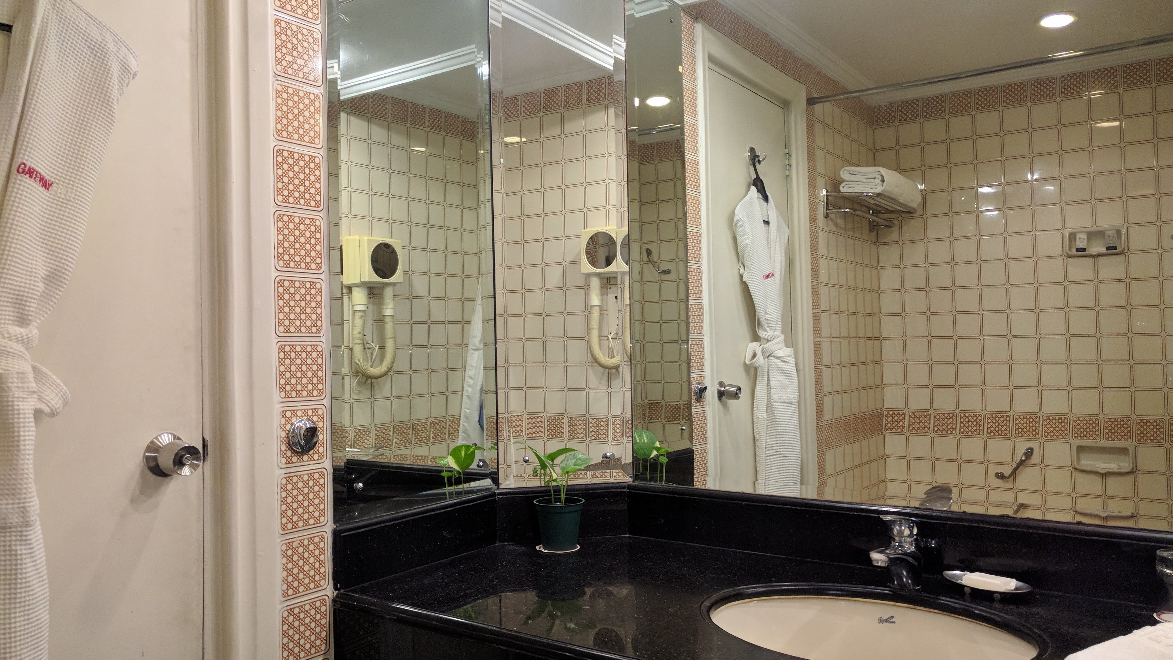 combined shower/bathtub, free toiletries, hair dryer, slippers