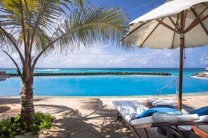 Outdoor pool, pool umbrellas, pool loungers