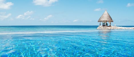 Outdoor pool, pool umbrellas, pool loungers