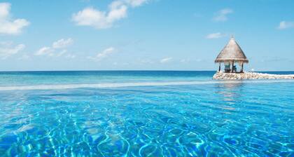 Taj Coral Reef Resort & Spa Maldives – A Premium All Inclusive Resort